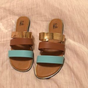 Blue, brown, and gold sandals